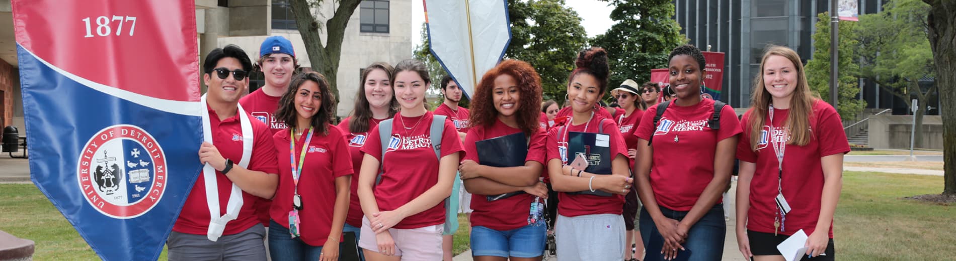 A group of orientation student leaders gather on McNichols Campus for the PTV program.